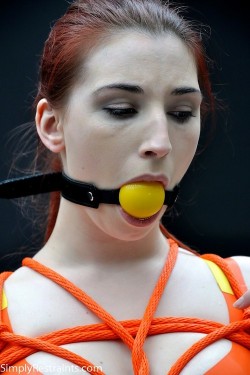 punish-her-porn:  Tied redhead with yellow