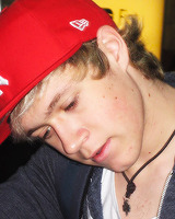 starkniall:  Niall Horan + His cute clover necklace. 