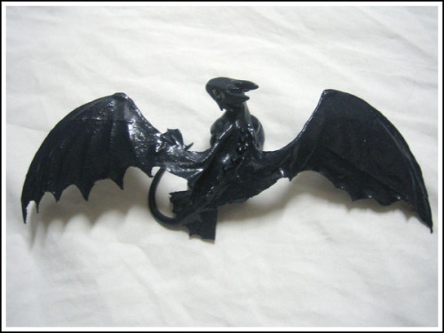 Toothless!  sculpted from polymer clay, wire, and tissue paper. painted with acrylic and enamel