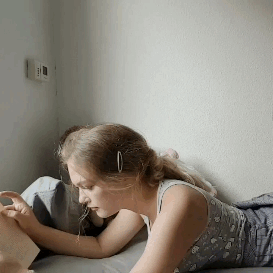 cutegirlsgalore:   I’m in my room doing my reading, when I notice you staring at