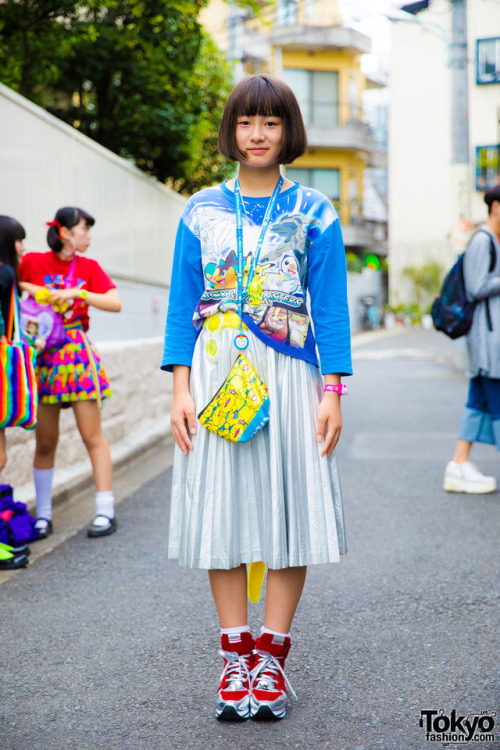 tokyo-fashion:  14-year-old Nanase’s Pokemon themed look on the street in Harajuku with a resale Pocket Monsters sweatshirt from Kinji, a silver pleated midi skirt, platform sneakers, kawaii accessories, and a plush tail. Full Look