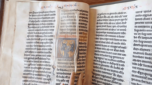 thegetty:A silk textile curtain sewed into this 13th century bible to protect the delicate gold leaf