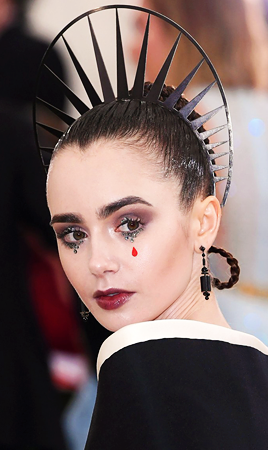 dailylilycollins:Lily Collins attends the Heavenly Bodies: Fashion & The Catholic Imagination Co