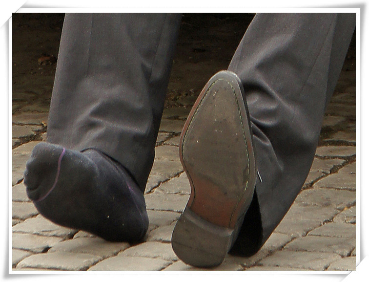 malesoxlover:  man took off his shoesperhaps there was stone or sands in his shoe