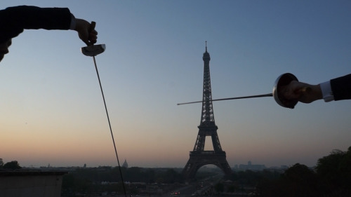 modernfencing:  [ID: two men in suits fencing with epees in Paris.]lejournaldesjo:  Gauthier Grumier and Ronan Gustin , french fencers in Paris for the Challenge SNCF Reseau in Paris