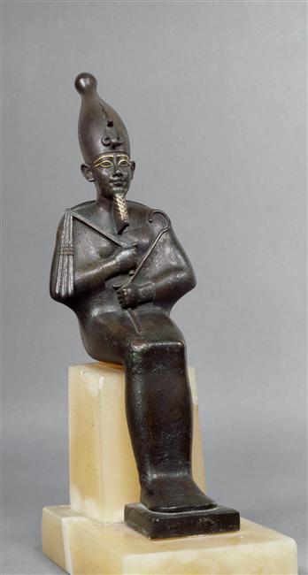 Statue of Osiris, seated and holding crook and flail (bronze and gold). Late Period, ca. 664-332 BC.