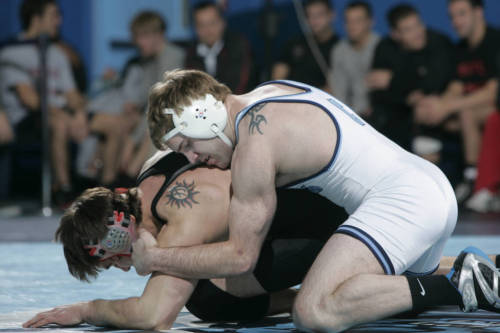 jockbrad:  Swimmers, wrestlers, football players / singlets, jockstraps, speedos and spandex! http://jockbrad.tumblr.com/ 