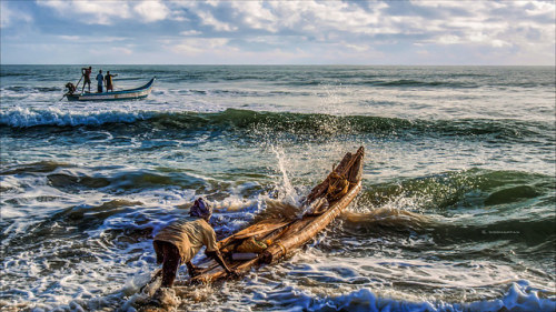 Evolution by oochappanMamallapuram - Mahabalipuram - TamilnaduMost fishermen have a polyester boot n