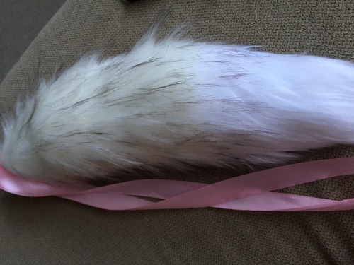 kittensplaypenshop:  lolita-fox:  This is going to be my official @kittensplaypenshop​ review for my two items: 18″ arctic fox tail w/ white tip and bubblegum ties and my Midnight (?) Sakura collar 12″ with a pentagram charm and pink crystal charm.