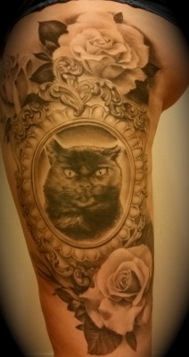 fuckyeahtattoos:  Done by Tomas Archuleta at True Fit Tattoo in San Diego, CA. What can I say, I love my cat.