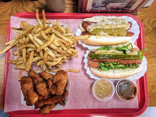 food-porn-diary:[OC] Chicago style dog, Georgia Red Hot, Salt and Pepper Fries, Chicken Tenders at S