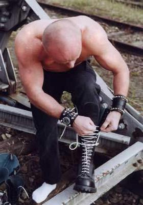 wp88:  bootslaveboyusa:  Skinhead, white laced boots and socks. Could a faggot ask
