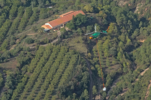 Helicopter over Montserrat mountains