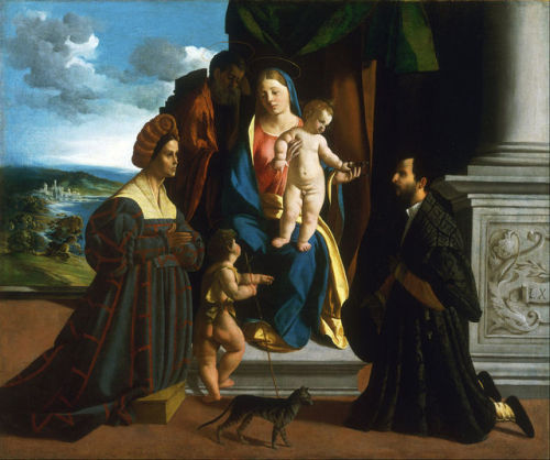 The Holy Family, with the Young Saint John the Baptist, a Cat, and Two Donors by Dosso Dossi, 1512-1