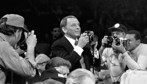 Frank Sinatra photographing Ali vs. Frazier I for LIFE magazine at Madison Square Garden, New York, 