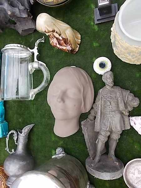 Some merchandise from antiquities market in Wroclaw, Poland (May 2022).