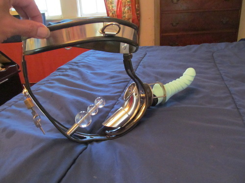 locked2012:  An ‘all in one’ chastity belt for men.. locked straight down, has