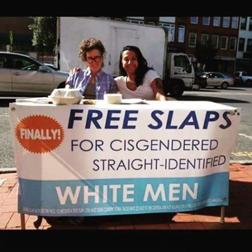 anti-feminism-pro-equality:  the-once-and-future-lost-cause:  biphobicerasurer:  anti-feminism-pro-equality:  I will find this booth and slap the shit out of them. It says “free slaps for straight cis men” so straight cis men get to slap them for