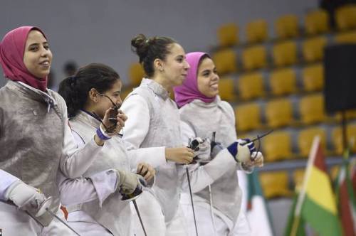 modernfencing: [ID: a foil team posing with sunglasses.] The Egyptian women’s foil team at the