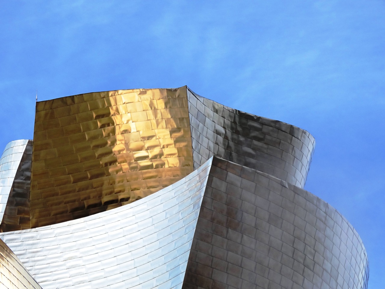 Clouds (No. 701)Bilbao, Spain #Bilbao #Guggenheim Museum Bilbao  #Frank O. Gehry #Frank Gehry#travel#architecture#façade #I really love the first pic #cityscape#tourist attraction#landmark#stainless steel#exterior#summer 2020 #province of Biscay #Spain#Basque Country#España#Northern Spain#Southern Europe#original photography