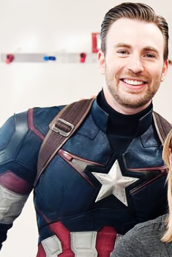 beardedchrisevans: Chris Evans wearing the Cap suit while visiting the Seattle Children’s Hospital   Cap. With a beard.Be still my beating heart.(Panties, stay!)