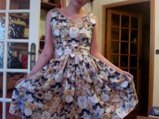 sequinsandstainz:  Made this darling little thing today! Kitty Cat Sundress!!!!!