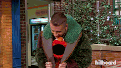 gaypee:  shinjigraham:  kaldriss:  macklemore absorbing elmo into himself to steal his power  is that a jacket made of bathroom rugs  but shit it was 99 cents