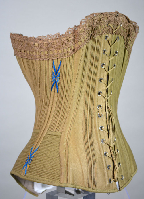 c1890. Busk front corset made from cotton twill lined in fawn coutil and interlined with hessian. Th