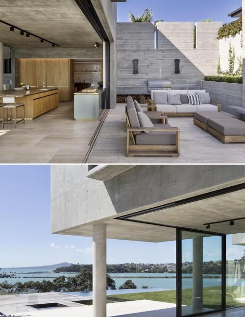 Indoor outdoor space in a concrete home on a cliff above Hobson Bay overlooking Auckland harbour, Ne