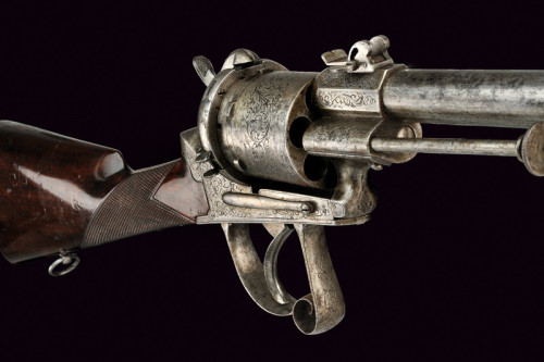 A unique Belgian pinfire revolving rifle with folding bayonet, mid 19th century.