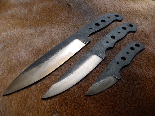 ru-titley-knives:  3 Amigos. I also got this camp knife blank back in 3.5mm thick high carbon saw blade steel . It should make a great companion to the bushcrafter and necker / pocket pal in the same steel ,once I decide on what the handles should be