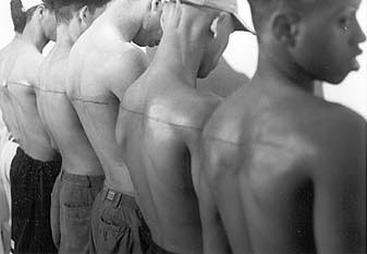 navisis:250 cm. Line tattoed on 6 paid people, 1999Santiago Sierra