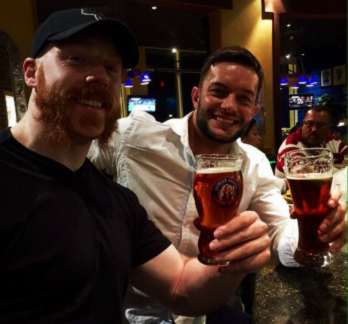 all-day-i-dream-about-seth:  : Having an ale with @wwebalor… Trying to console