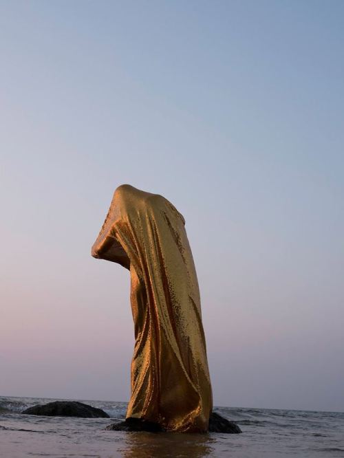 Eamonn Doyle - KIn a photo book that shifts between handwritten letters layered atop one another lik