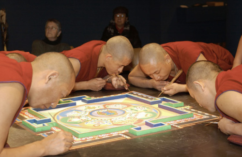 freersackler:  In response to the September 11 tragedies, twenty Buddhist monks from the Drepung Loseling Monastery constructed a sand mandala (sacred painting) at the Sackler in 2002. This seven-foot-square mandala, one of the largest ever created in