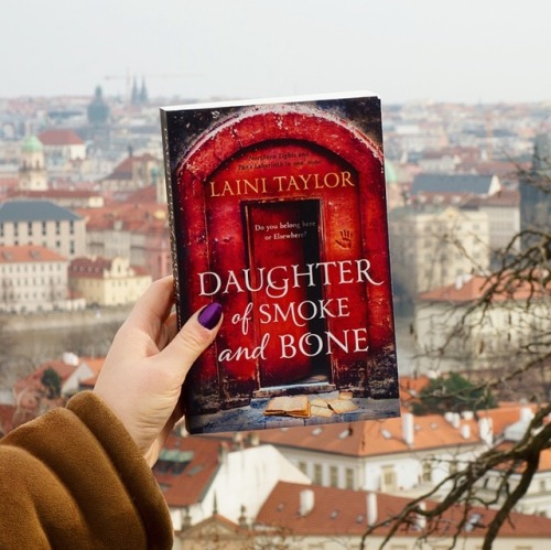 folding-corners:“Daughter of Smoke and Bone”, with Prague in the background! I loved both the book (