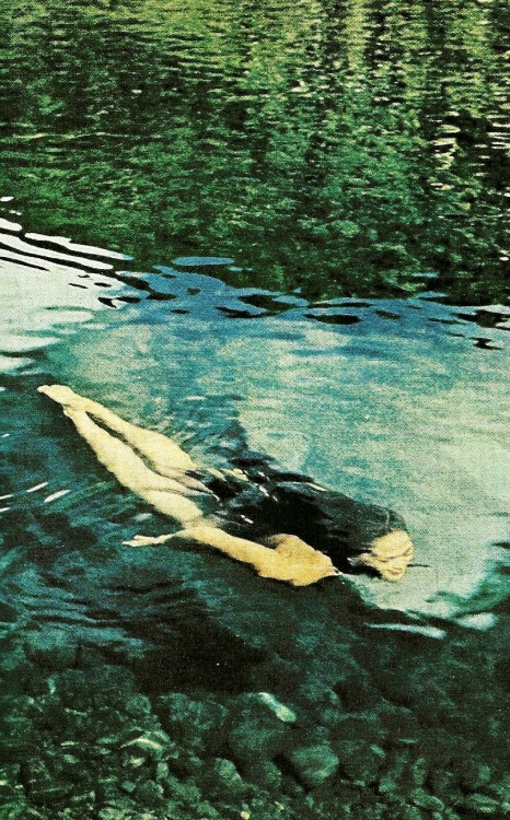 vintagenatgeographic:Girl dives in the Vaitepiha River, TahitiNational Geographic | July 1962 