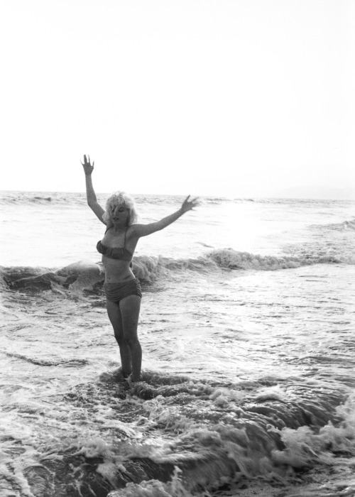 ourmarilynmonroe:  “Marilyn told me she loved the beach, when I suggested we take a series of photographs at the Santa Monica beach, she was thrilled.” - George Barris