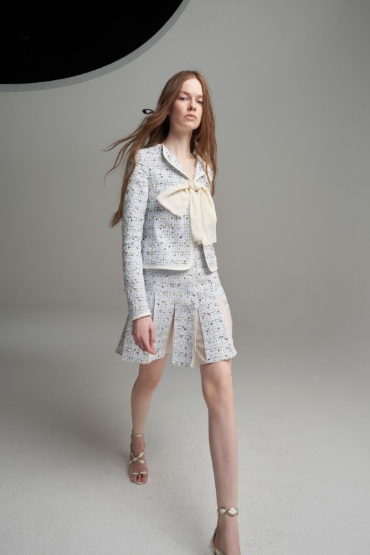 SLFMag — 1960's classic Chanel tweed mini skirt-suits and