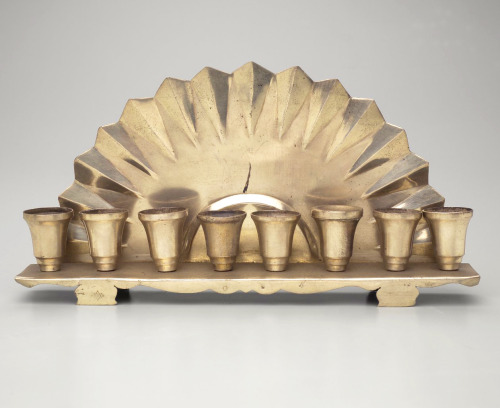 This exquisite silver-plated menorah was loaned to the Museum from the Jewish Cultural Reconstructio