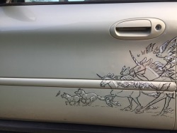 roachpatrol:  my car is all tricked out for halloween and probably the whole rest of the year as well! this took about four sit-down sessions to get it all marked out and finished. done with blue highlighter sharpie, black permanent sharpie, and white