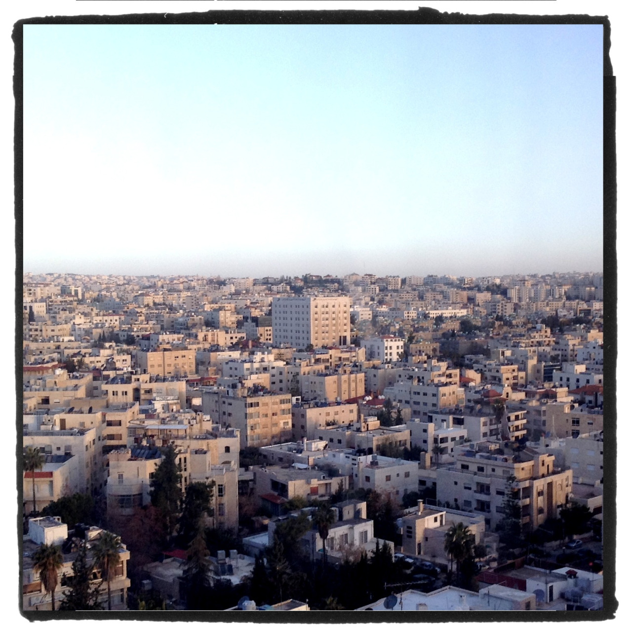 The Lego-like monotony of the Amman, Jordan, cityscape … But still we love the Orientalist light.