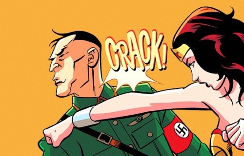 dianapforlunch: Reblog to spread the joy of Wonder Woman punching a Nazi.