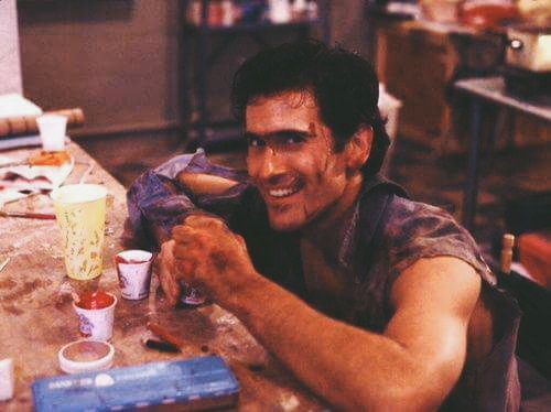 hellyeahhorrormovies:  Bruce Campbell on set of Evil Dead. 