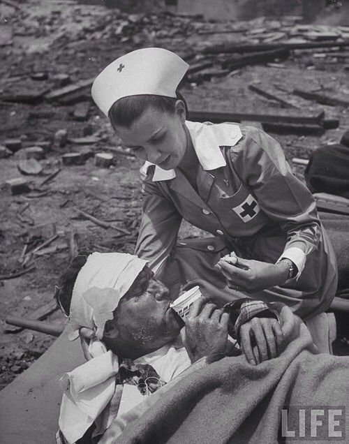 nurseshustle:  Red Cross nurse, 1951.  Photo by Allan Grant.
