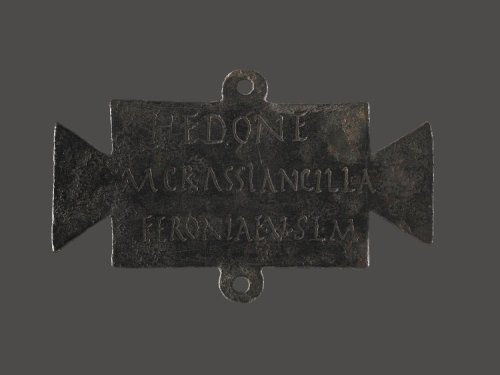 Bronze plaque inscribed with a dedication to Feronia, in fulfilment of a vow by Hedone, a Greek maid