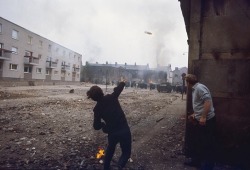 oglaighnaheireann: Irish youth throws projectile at British soldiers during The Troubles in the north of ireland   1970 