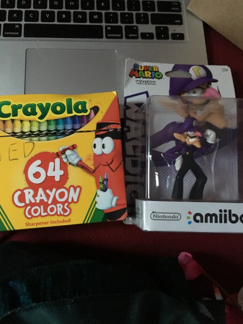 kissycutie:for christmas, my brother gave me a waluigi amiibo, crayons and a zine on waluigi that he