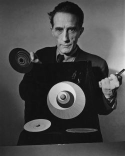 plantanoturnaetriste:    Marcel Duchamp with rotoreliefs, from Hans Richter’s film Dreams That Money Can Buy, 1947  