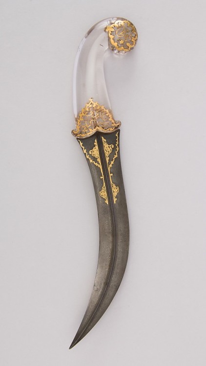 tofufanclub:  Jambiya Dagger  Dated: 18th–19th century Culture: Persian Medium: steel, crystal, gold Measurements: H. 13 3/16 in. (33.5 cm); H. of blade 8 ¾ in. (22.2 cm); W. 2 ½ in. (6.4 cm); Wt. 11.6 oz. (328.9 g)  Source: Copyright © 2014 The